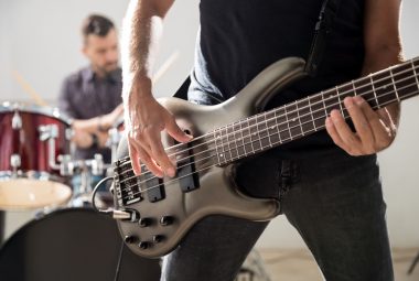 Playing bass guitar
